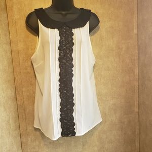 A. Byer sleeveless top